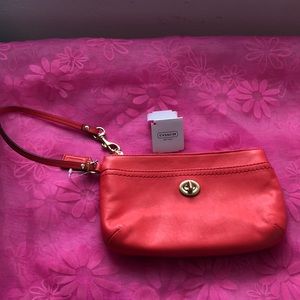 Coach Campbell turn lock medium wristlet.